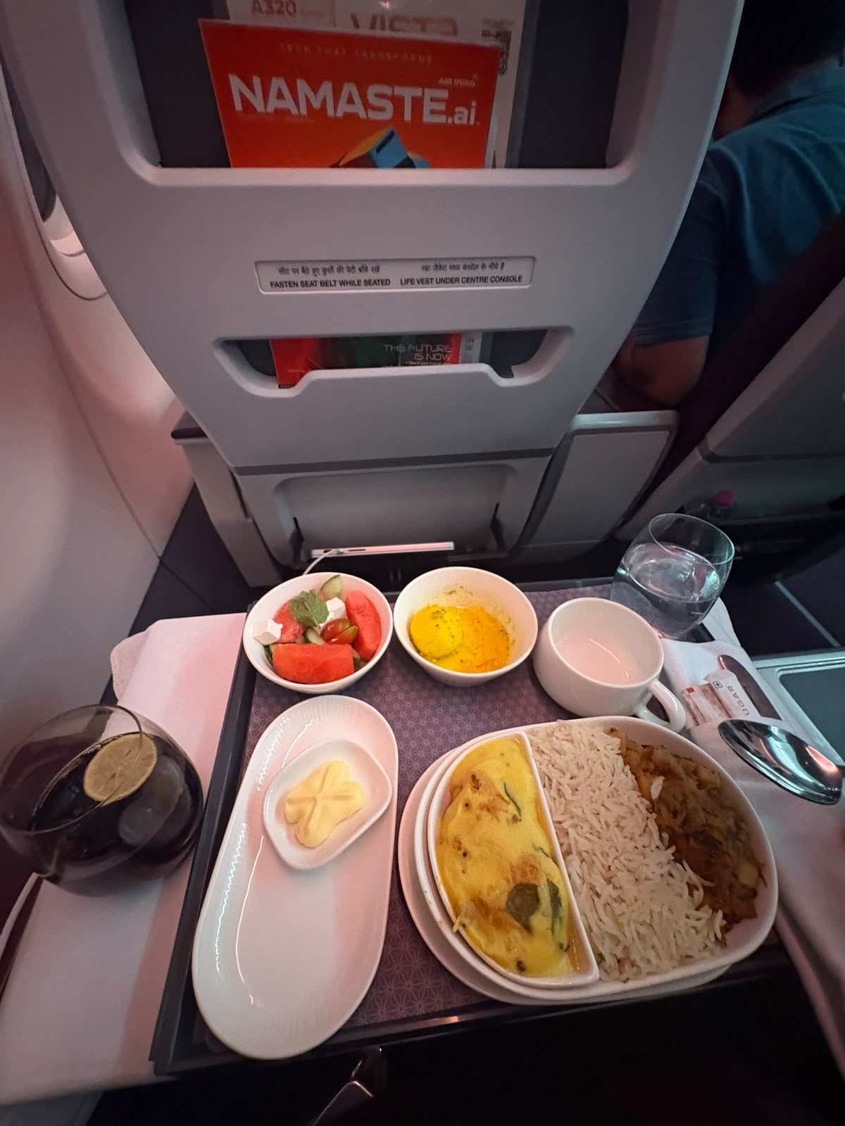 Business class inflight meal on an Air India flight from Bengaluru to Delhi, with Namaste magazine in the seat pocket
